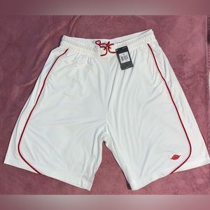 Jumpman Jordan basketball shorts white with red accents.